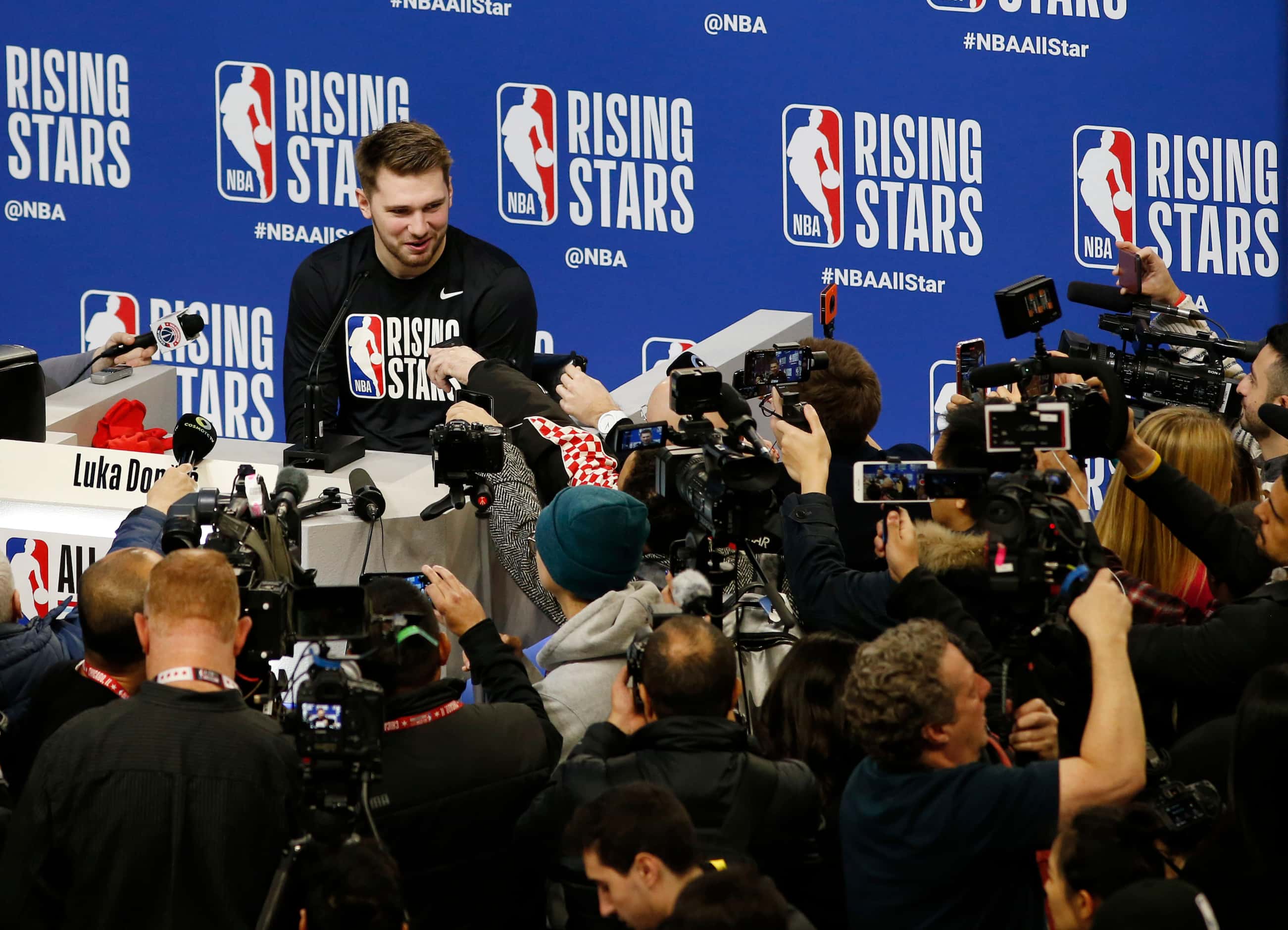 Dallas Mavericks forward Luka Doncic (77) answers questions from the media during NBA Rising...