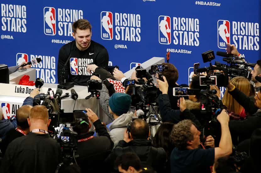 Dallas Mavericks forward Luka Doncic (77) answers questions from the media during NBA Rising...