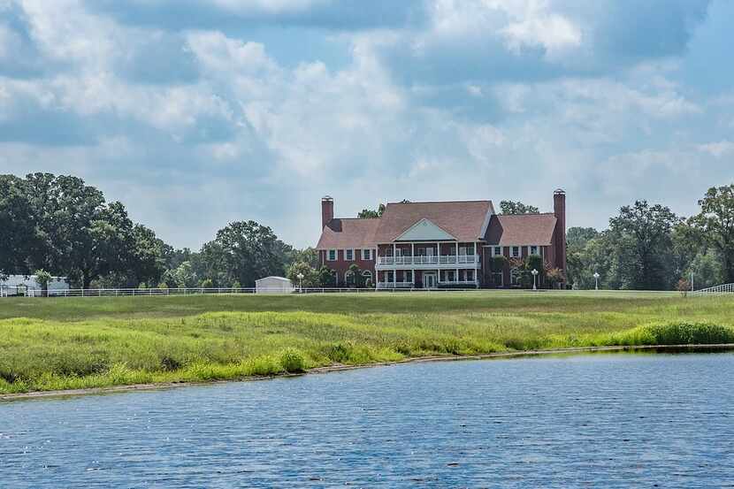 The 12,000-square-foot house near Grand Saline overlooks a private lake.