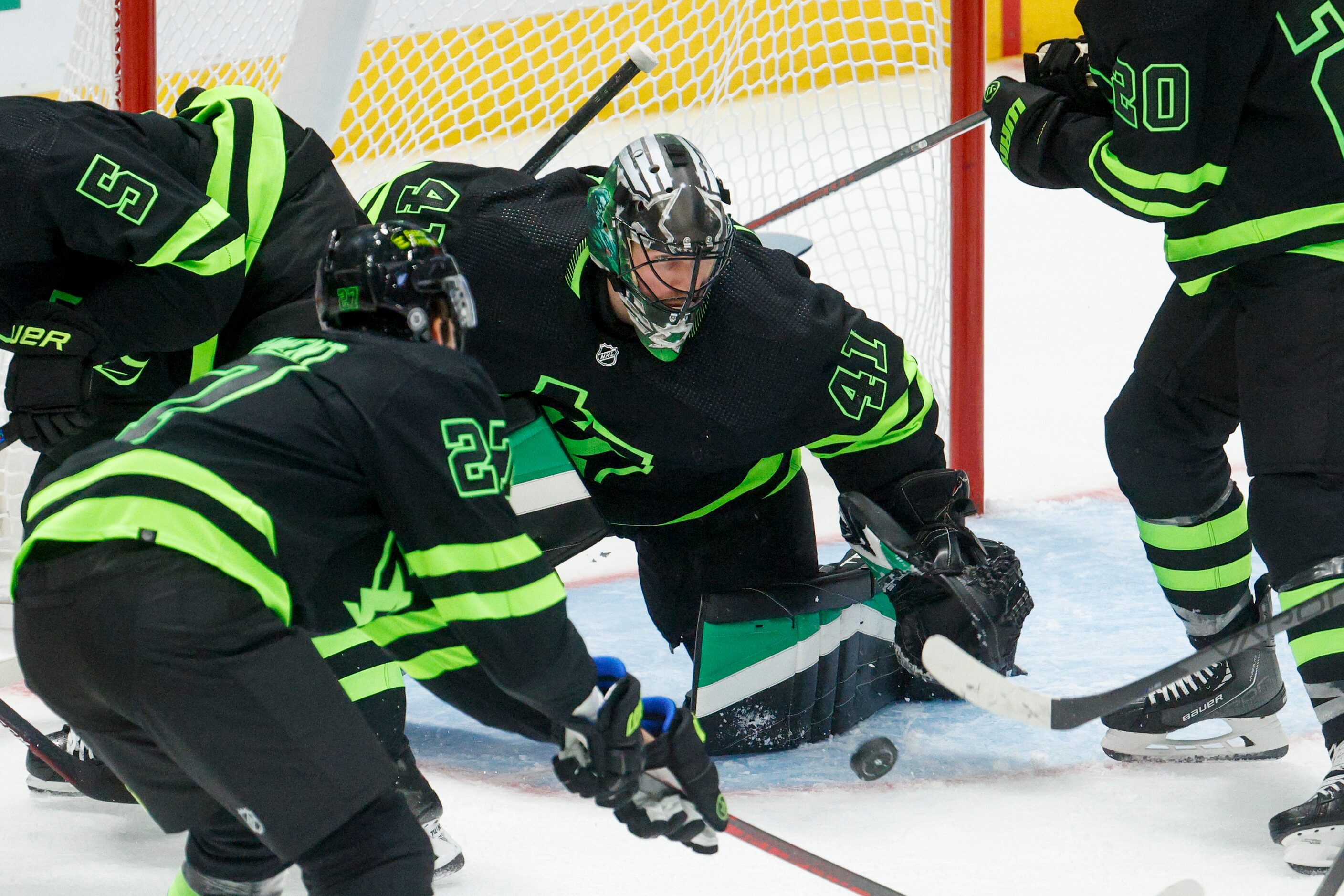 Dallas Stars goaltender Scott Wedgewood (41) stops a shot from New York Rangers right wing...