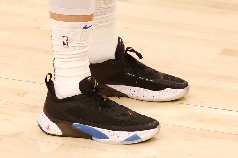Dallas Mavericks guard Luka Doncic (77)  wears his signature shoes Luka 1 in a game against...