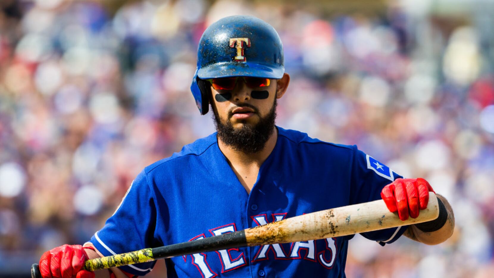Texas Rangers second baseman Rougned Odor (12) walks back to the dugout after striking out...