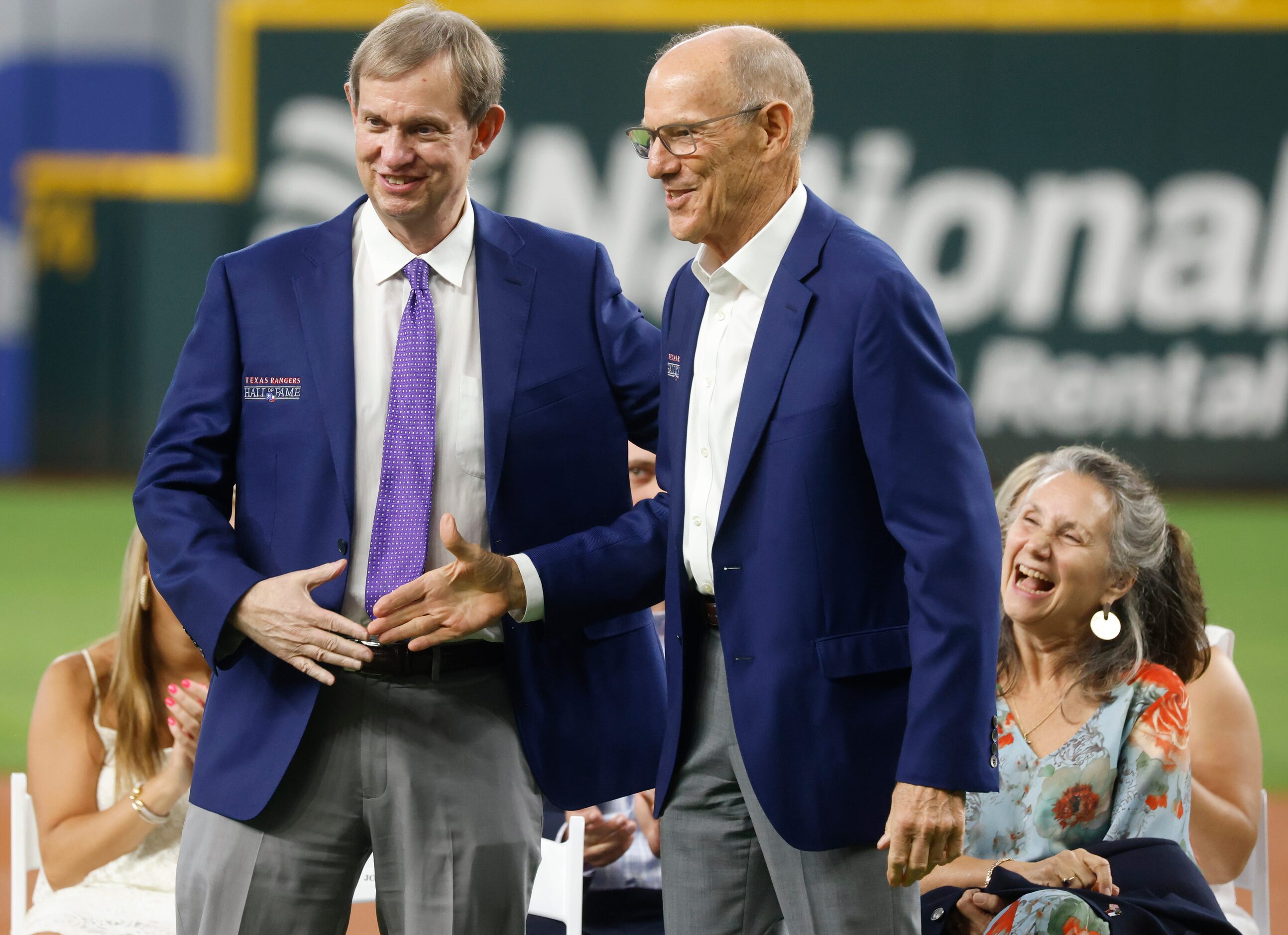 Fellow Rangers Hall of Famer Tom Grieve, right, shakes hand with Texas Rangers Executive VP...