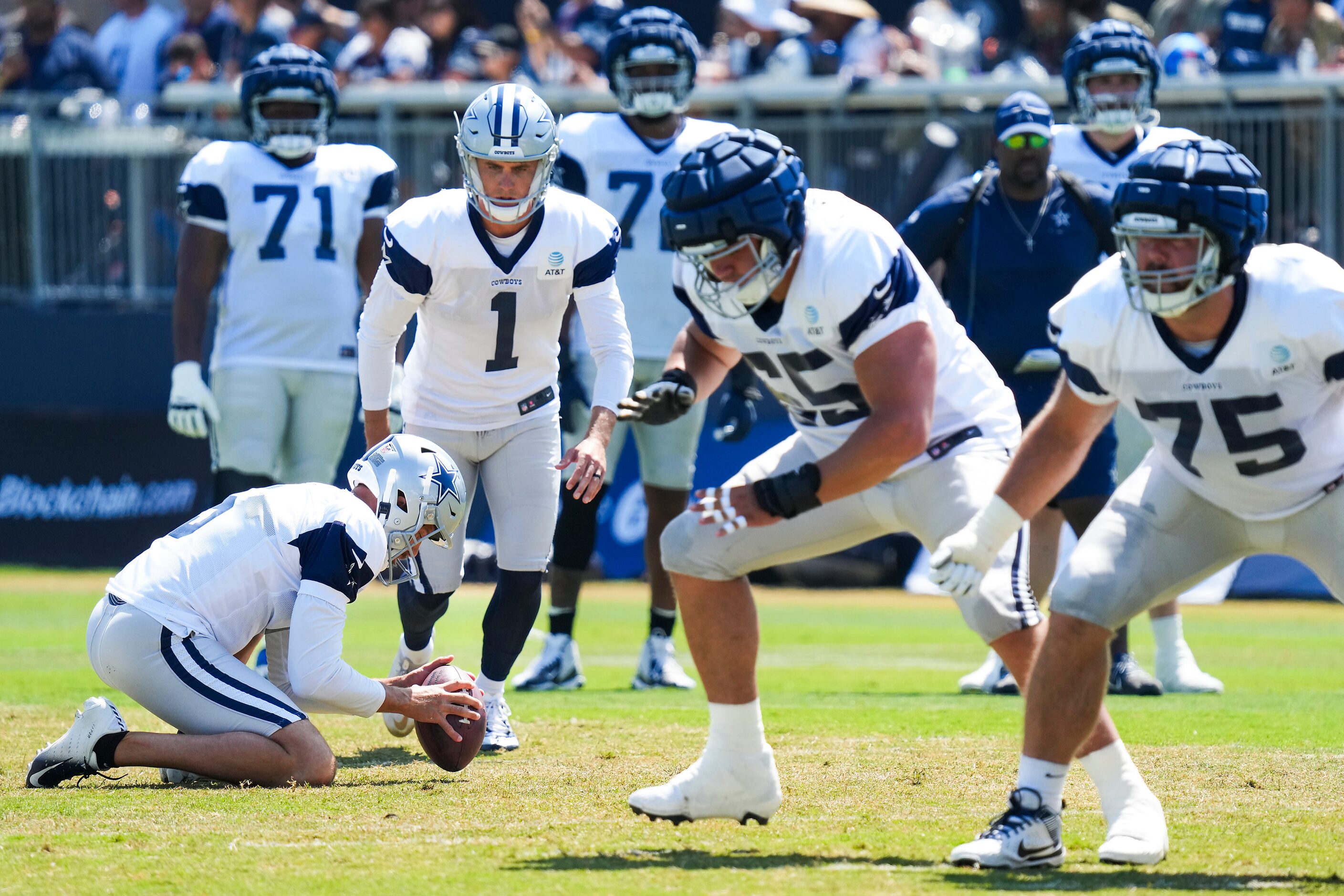 Dallas Cowboys kicker Brandon Aubrey (1) kicks a field goal from the hold of punter Bryan...