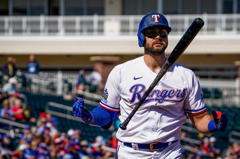 Texas Rangers outfielder Joey Gallo reacts after striking out during the first inning of a...