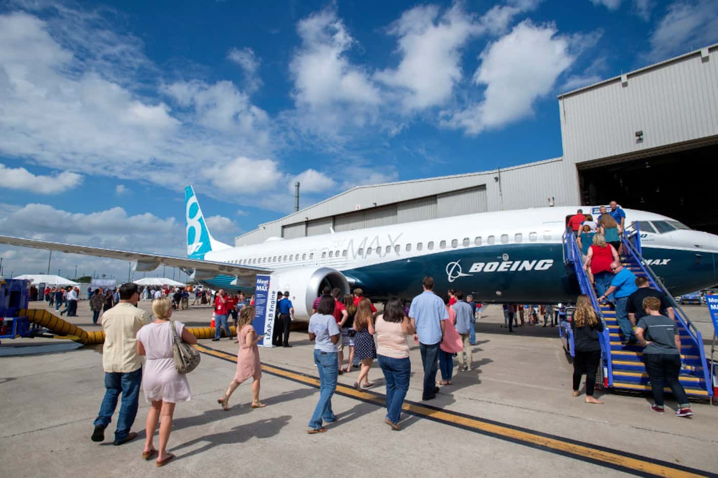 Southwest Airlines employees line up to have a first look at the new Boeing 737 MAX jetliner...