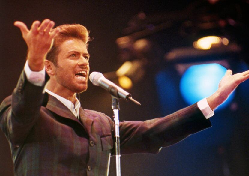 In this Dec. 2, 1993 file photo, George Michael performs at "Concert of Hope" to mark World...