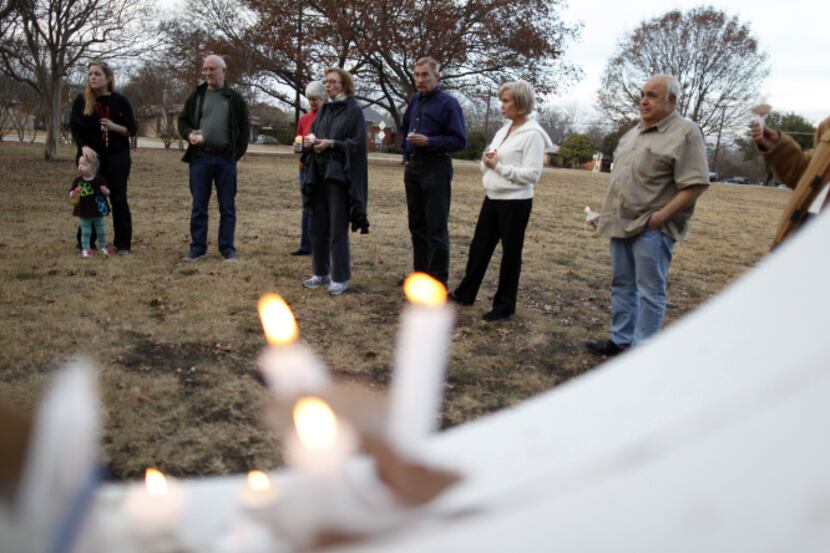 At the vigil, violin teacher Irene Mitchell said the shooting hit home. “It’s hard because I...