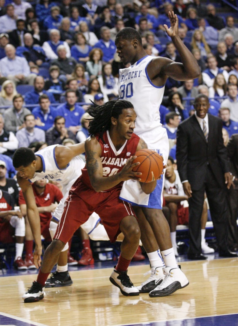 Mar 4, 2014; Lexington, KY, USA; Alabama Crimson Tide guard Levi Randolph (20) dribbles the...