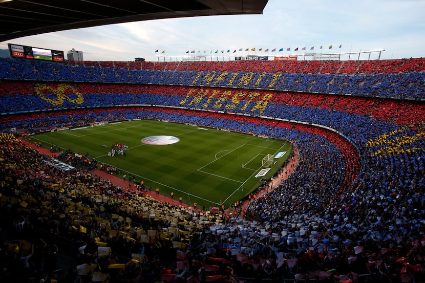 FC Barcelona's supporters pay tribute to Barcelona's Andres Iniesta prior of the Spanish La...