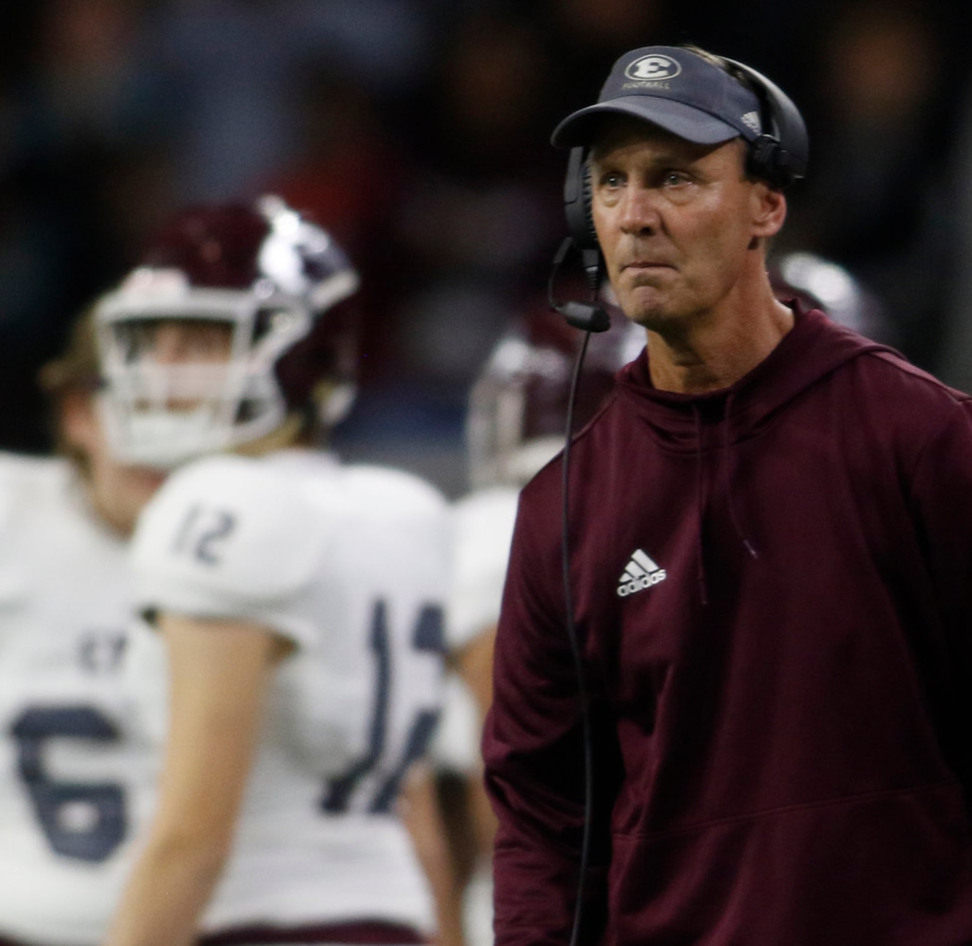 Ennis head coach Sam Harrell watches intently from the team sideline during second quarter...