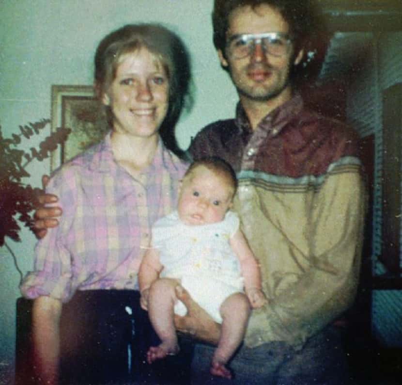 An undated file photo of David and Rachel Koresh with their son, Cyrus.