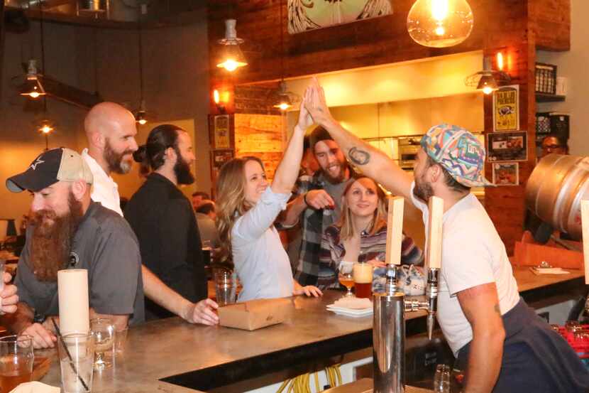 It was a high-five-worthy occasion Sunday at Luck in Trinity Groves. The bar and restaurant...