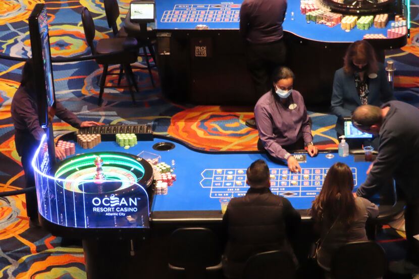 As gambling expansion is debated again in Texas, a dealer conducts a roulette game at the...