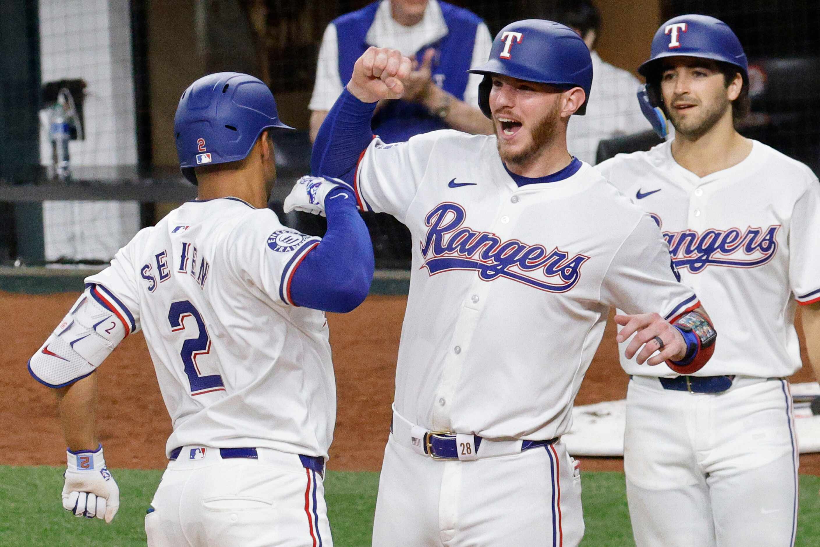 Texas Rangers second base Marcus Semien (2) celebrates with his teammates Texas Rangers...