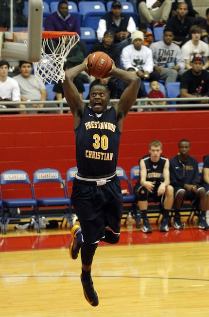 Prestonwood's Julius Randle (30) prepares to dunk against  Madison Prep Academy during the...