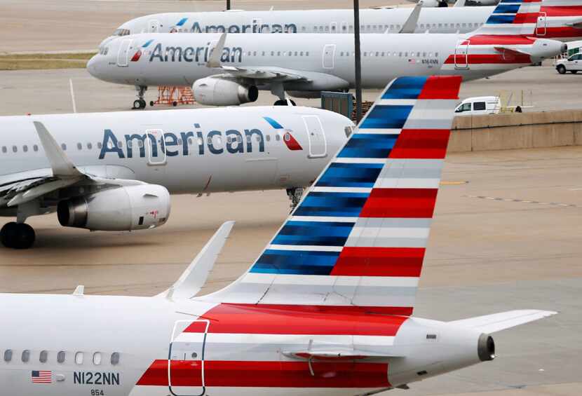American Airlines planes in between Terminal A and C at DFW International Airport in...