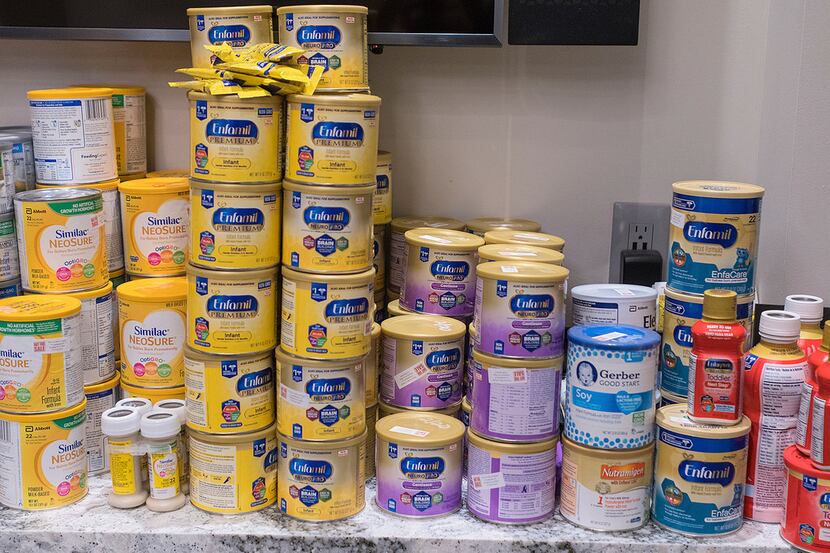 Baby formula lines the shelf in the Cambria Gallery during Feeding Every Baby Formula...