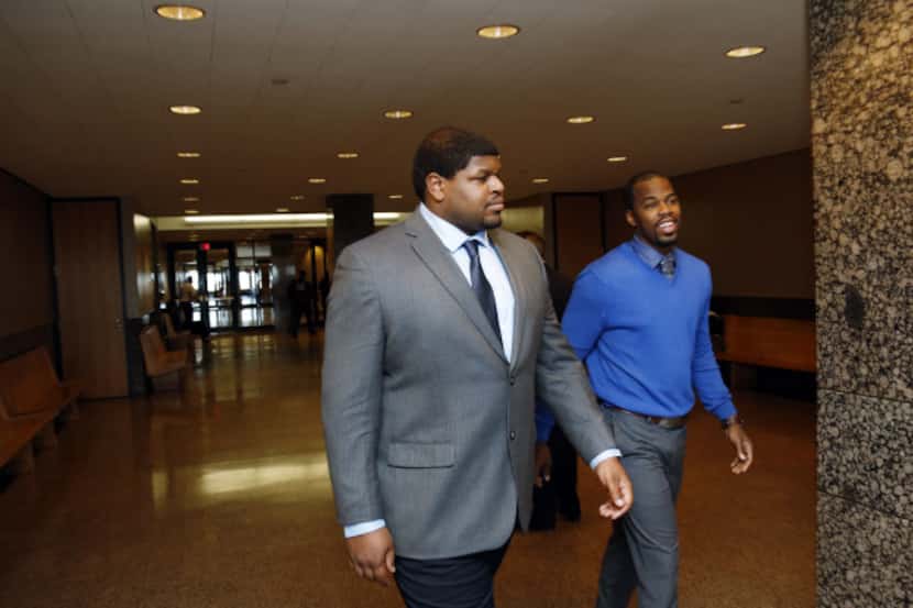 Josh Brent (left) left the courtroom during a break in his trial Monday at the Frank Crowley...