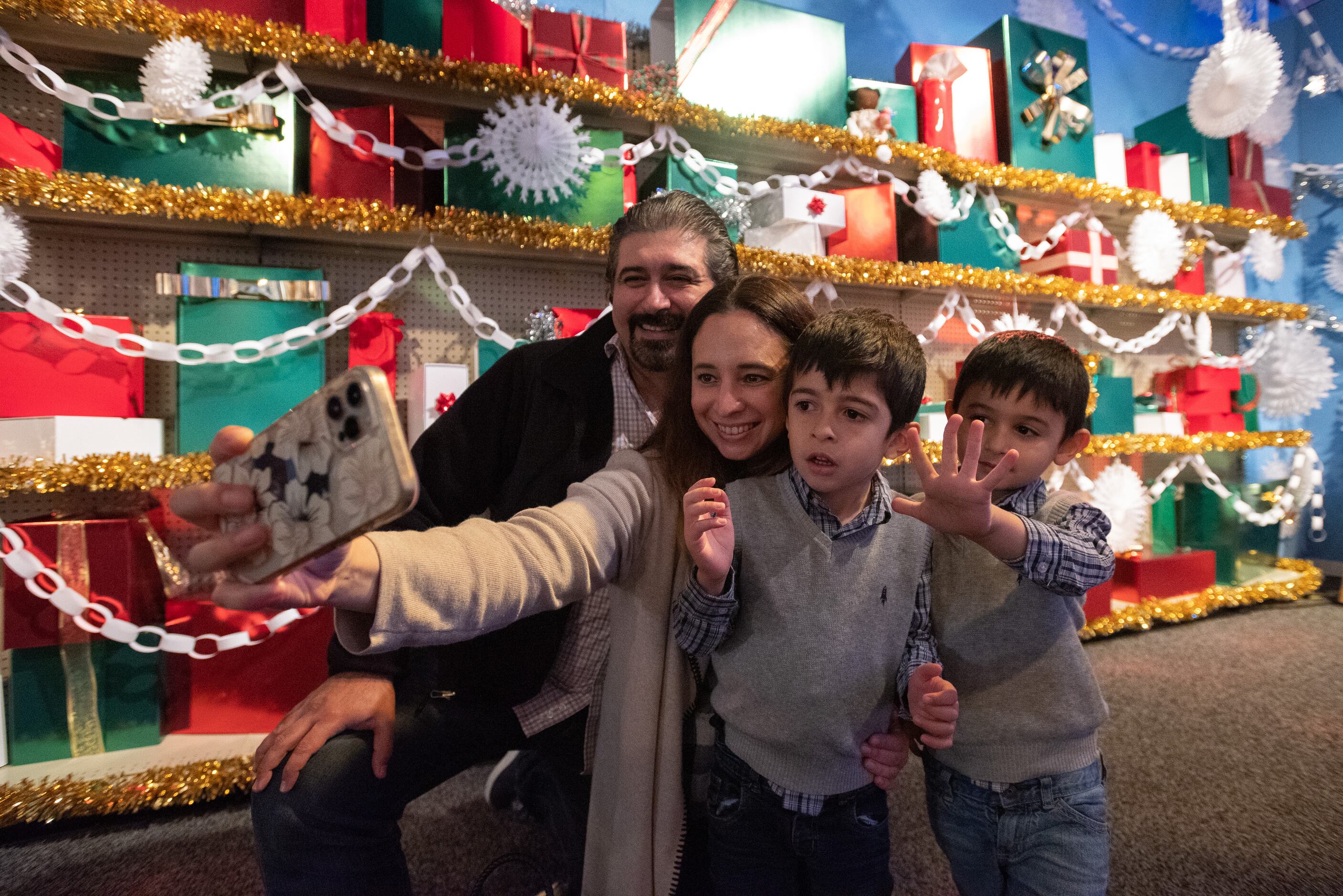 The Mtanous family visits "Mission: Save Christmas Featuring 'Elf,'" a new part of the...