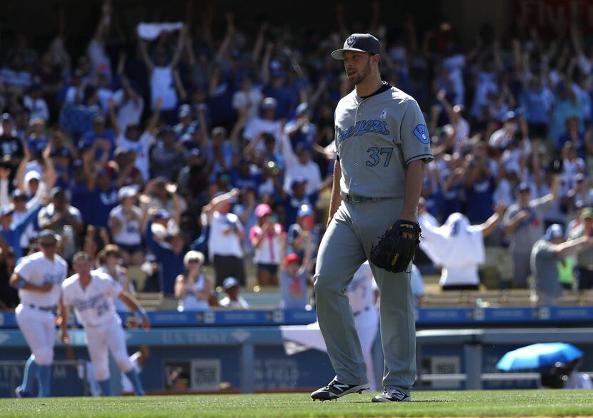 LOS ANGELES, CA - JUNE 19: Pitcher Tyler Thornburg #37 of the Milwaukee Brewers walks off...