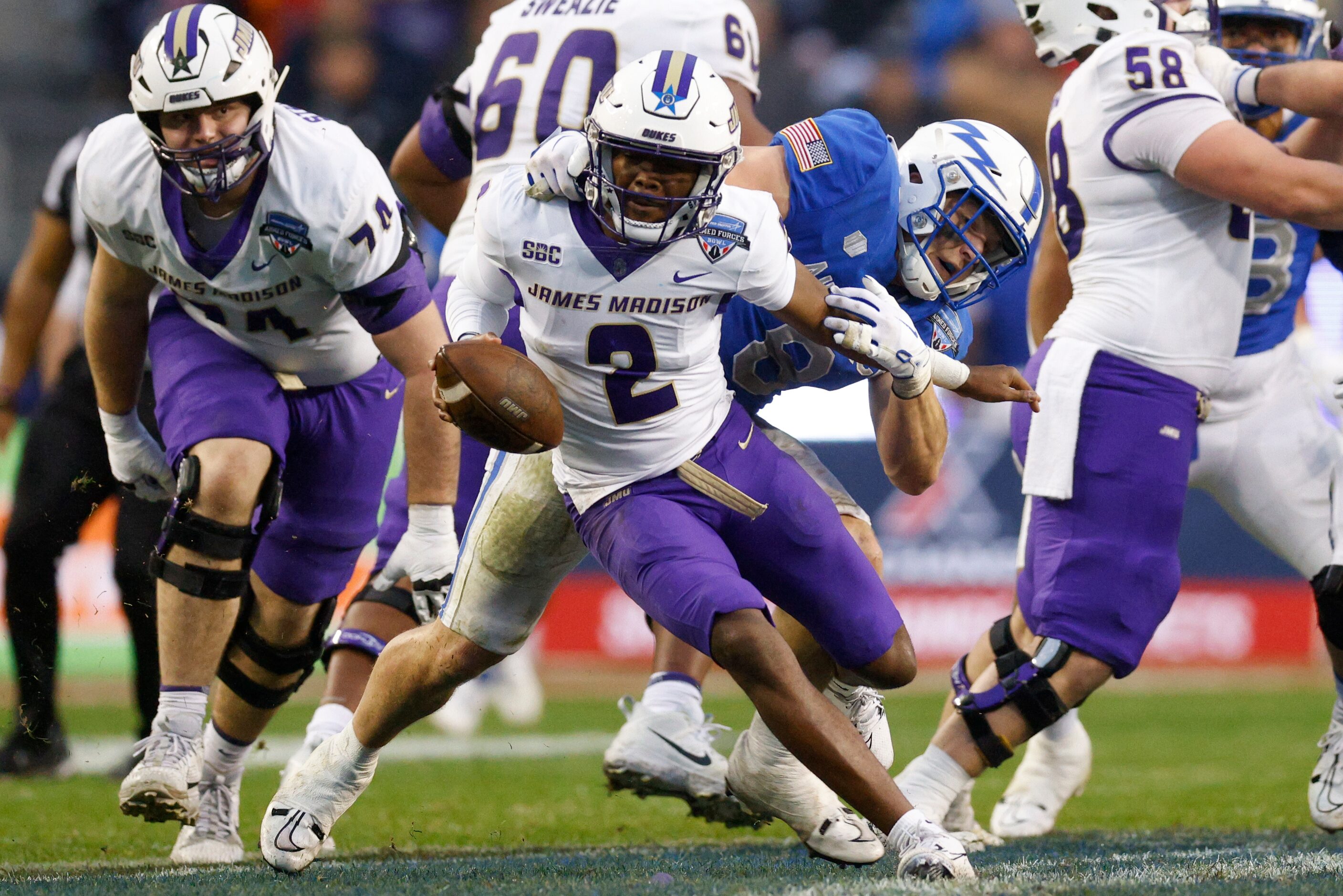 Air Force Falcons linebacker Bo Richter (8) sacks James Madison Dukes quarterback Jordan...