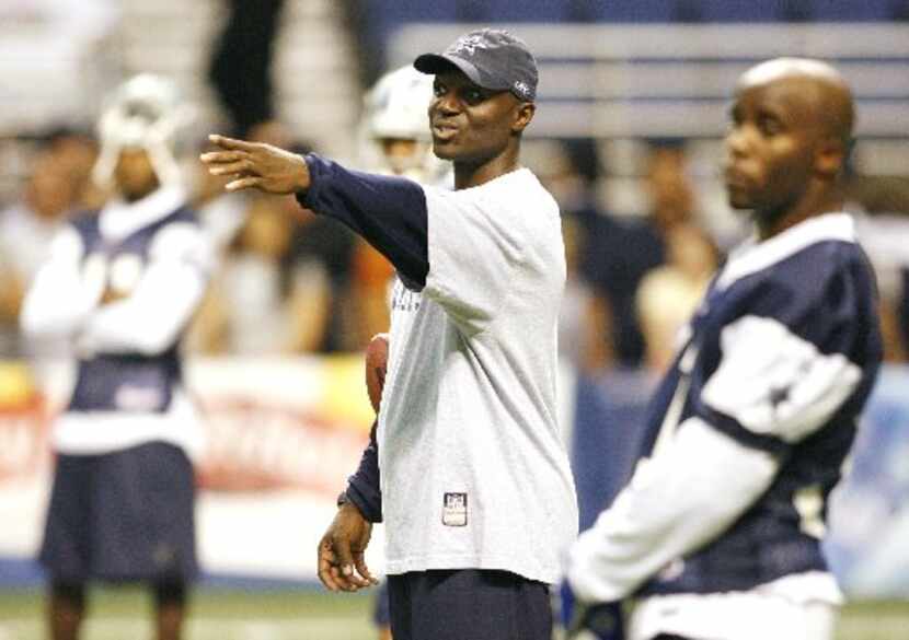 Dallas Cowboys defense secondary coach Todd Bowles directs the defense during training camp...