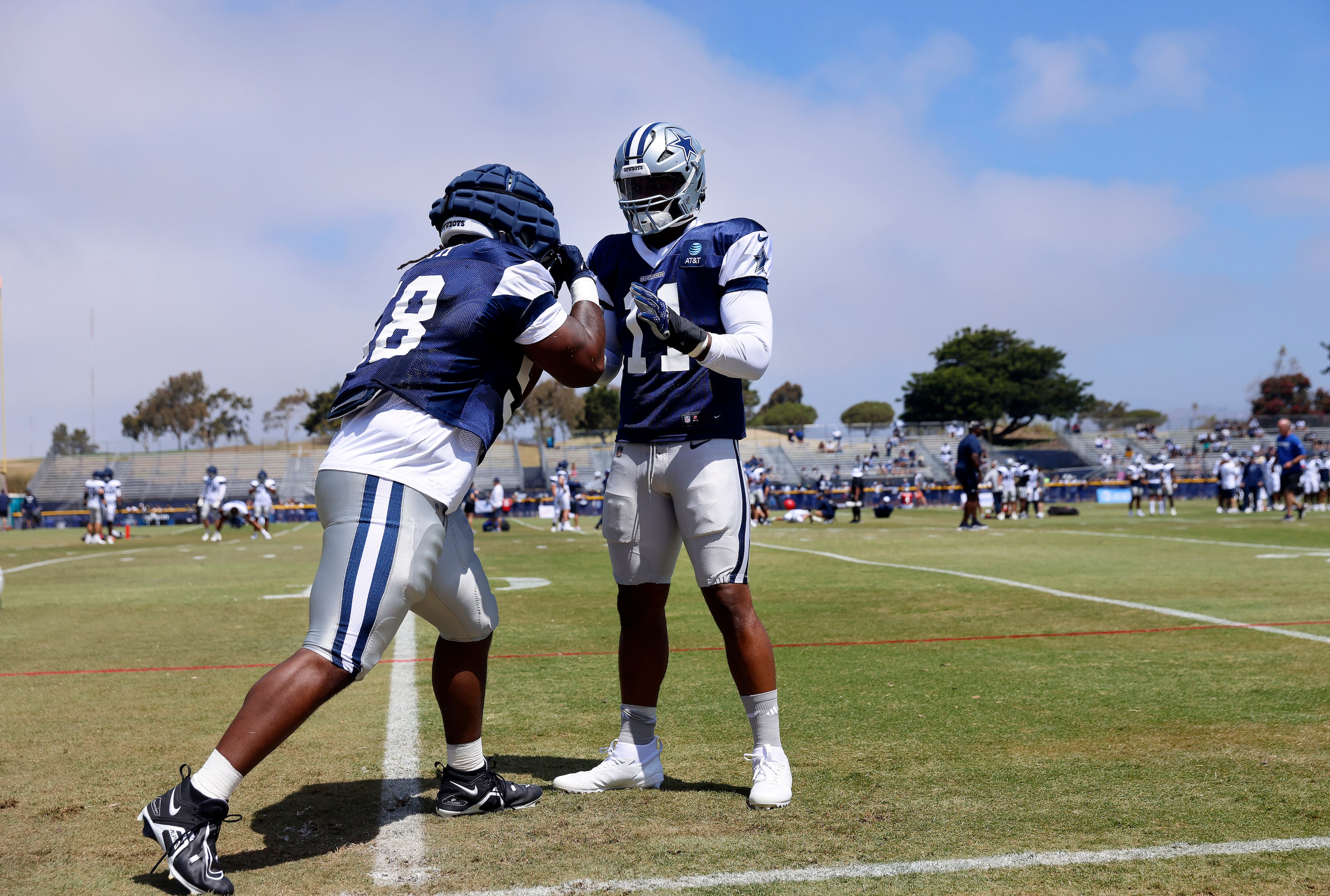 Dallas Cowboys defensive tackle Mazi Smith (58) defends himself against linebacker Micah...