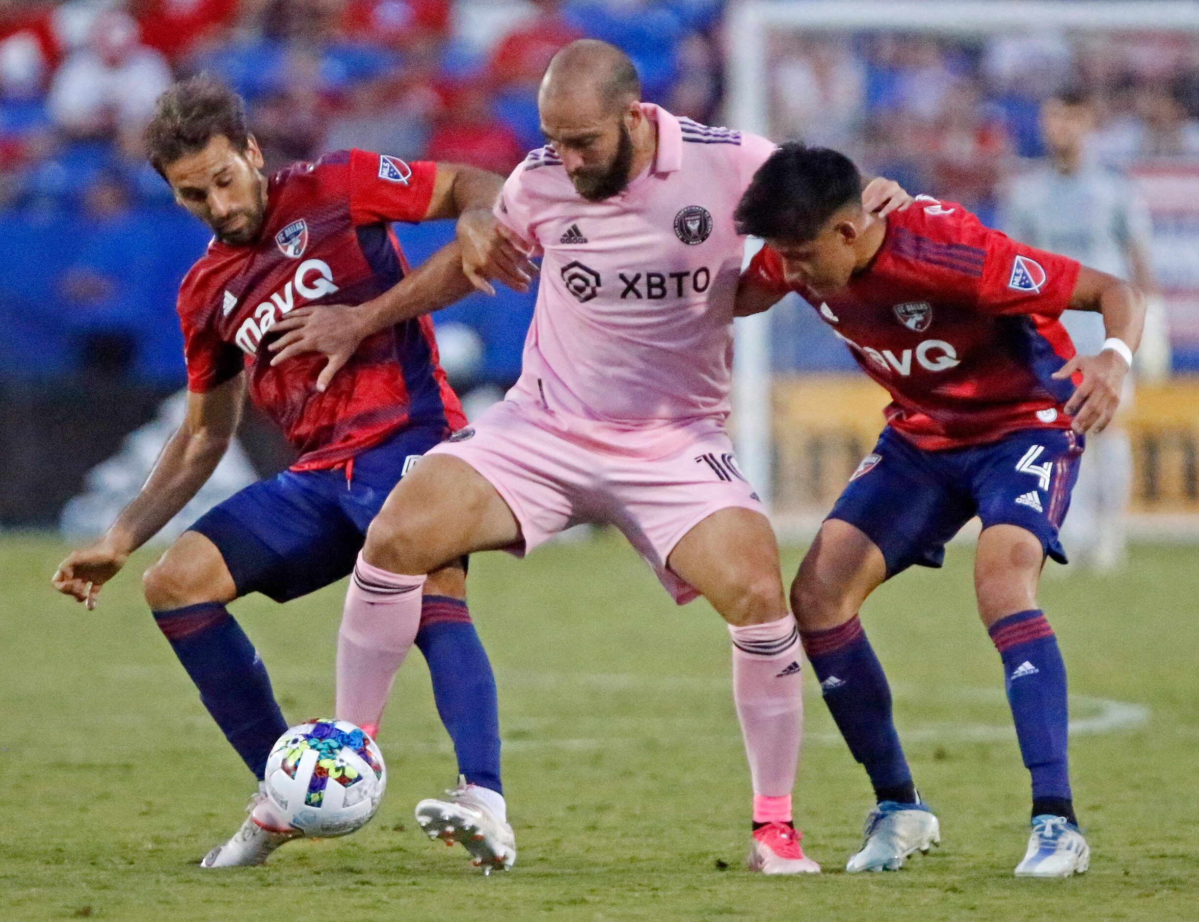 FC Dallas midfielder Facundo Quignon (5) and FC Dallas defender Marco Farfan (4) play both...