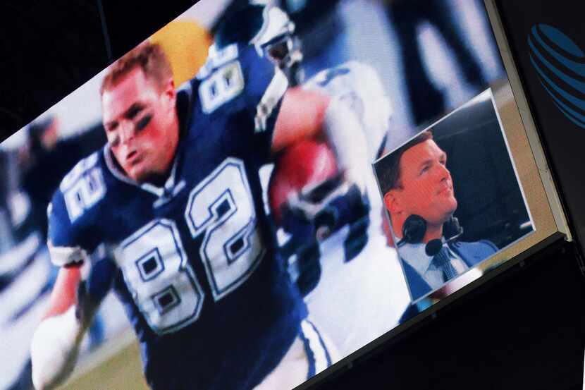 Former Dallas Cowboys tight end and ESPN broadcaster Jason Witten (lower right) reacts to a...