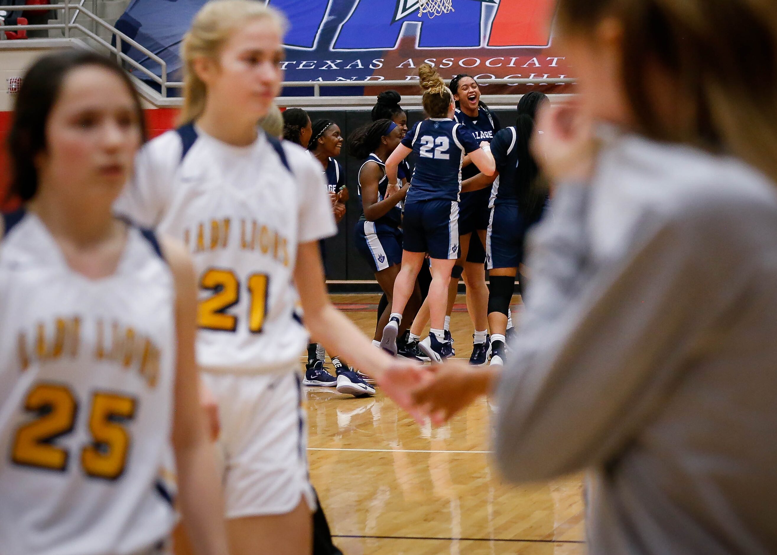 Players from the Village School celebrate after beating Plano Prestonwood Christian during a...