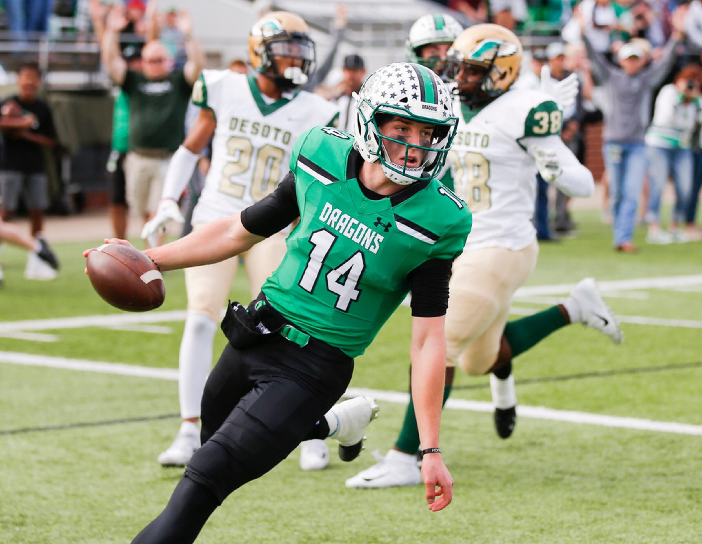 TXHSFB Southlake Carroll senior quarterback Will Bowers (14) scores a touchdown during the...