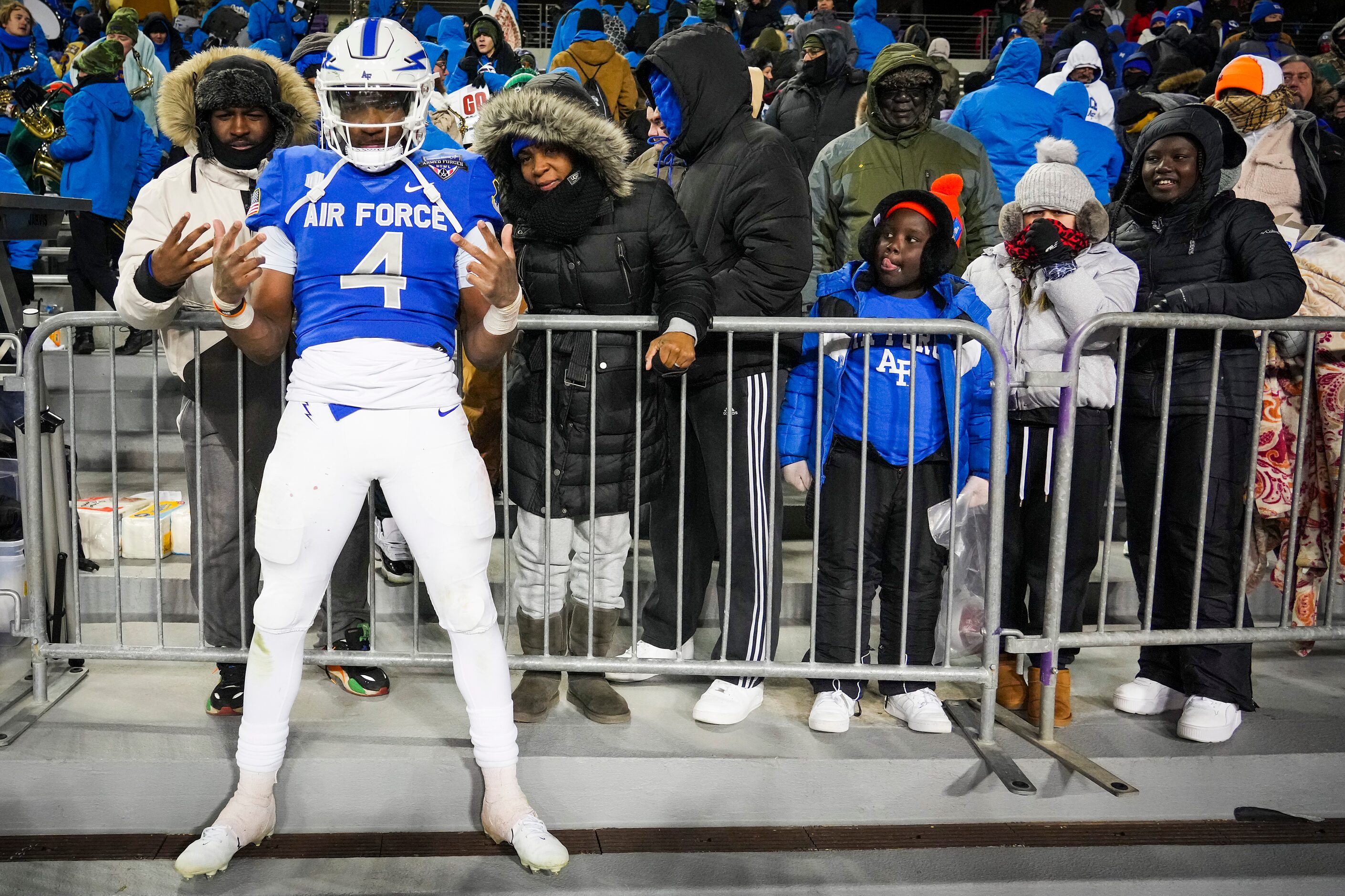 Air Force quarterback Haaziq Daniels celebrates after a victory over Baylor in the Armed...