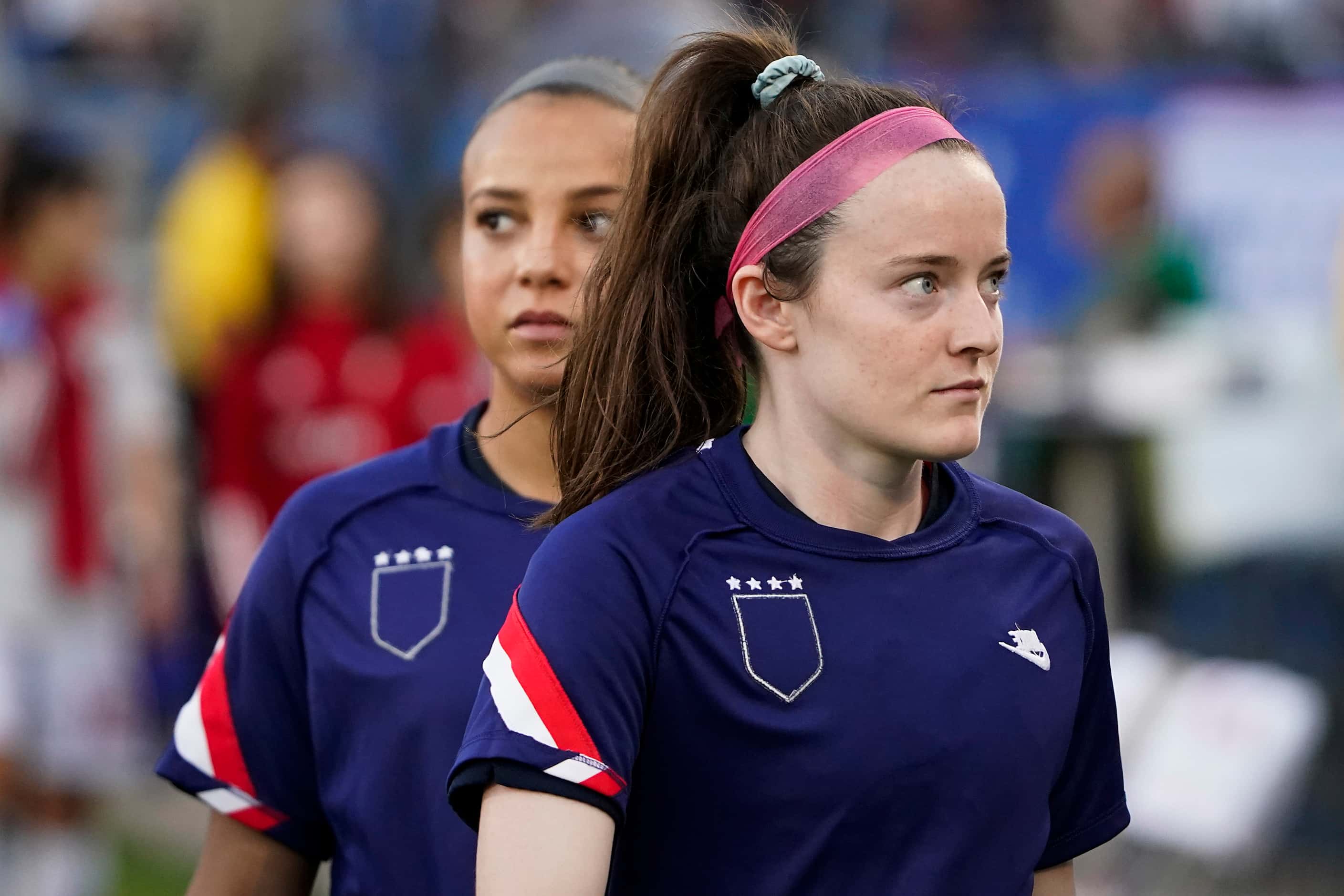 USA midfielder Rose Lavelle takes the field with her warmups turned inside out before a...