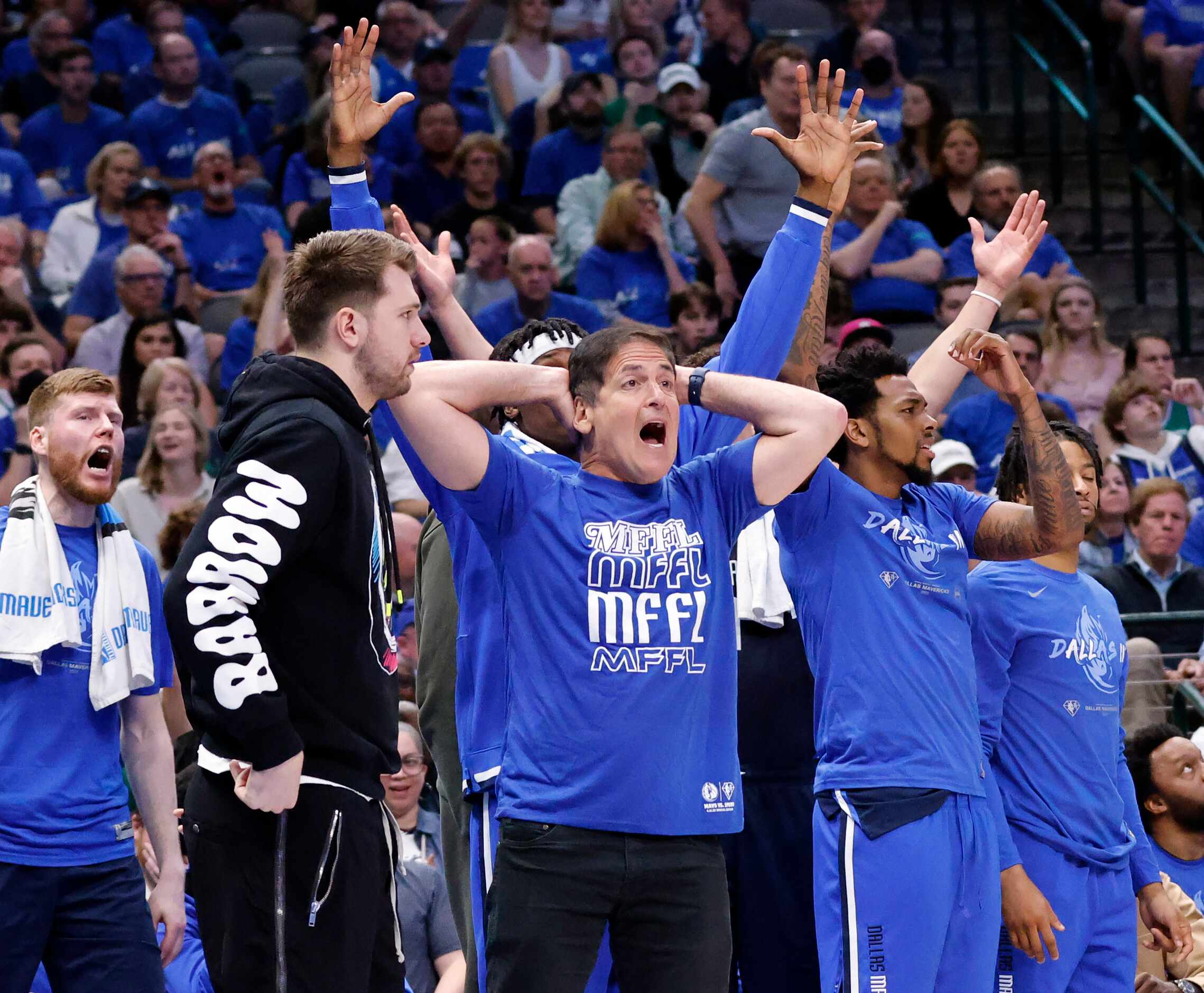 Dallas Mavericks oner Mark Cuban reacts to a called foul on his team during the first half...