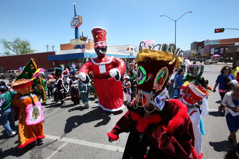 A group of Chinelo dancers participate in the 2013 Cinco de Mayo parade on Jefferson Street...
