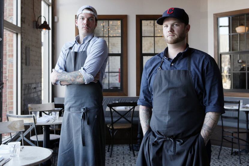 Filament chef-pwner Matt McCallister (left) and executive chef Cody Sharp discuss  Leslie...