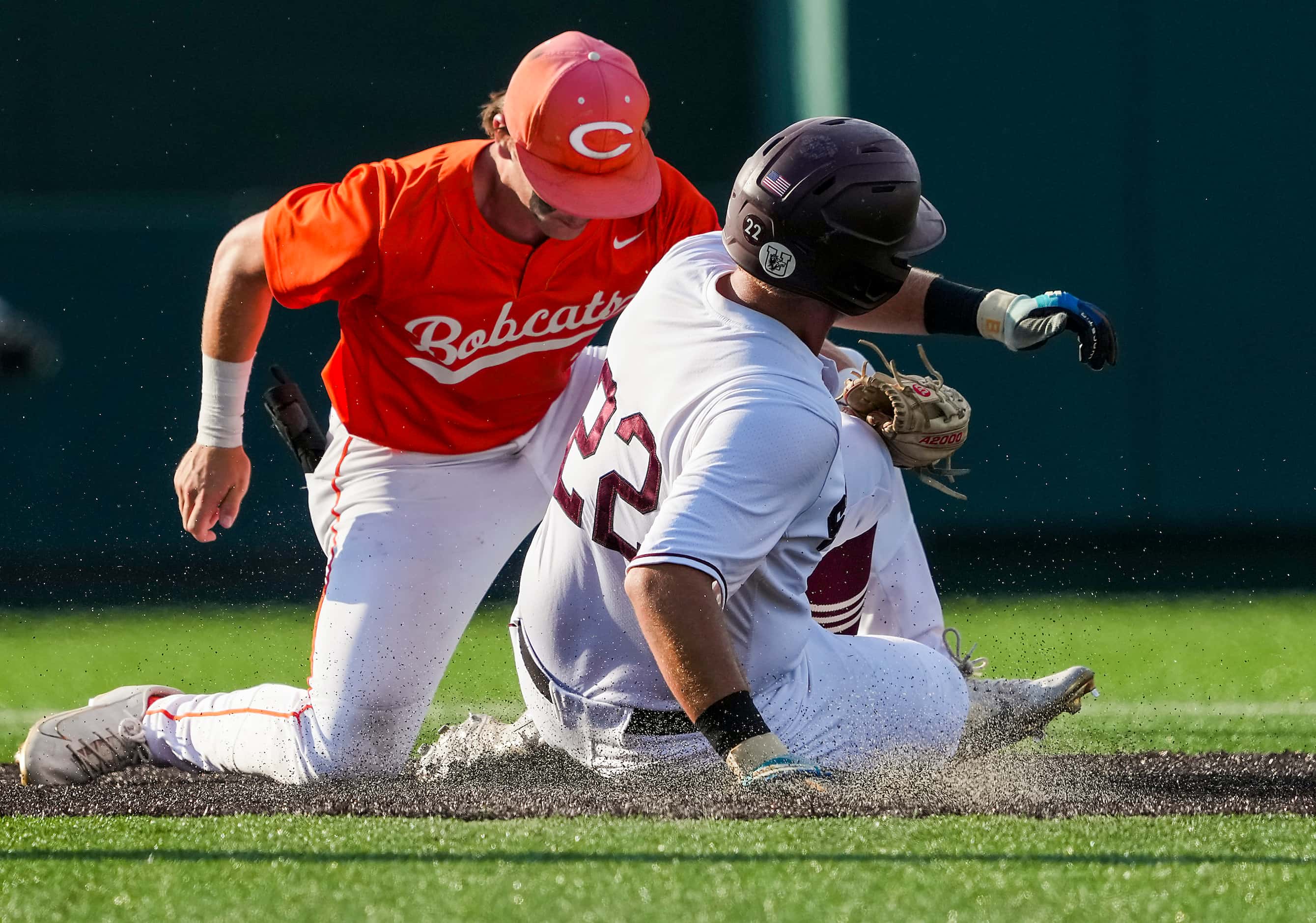 Sinton outfielder Canon Chester (22) is caught stealing at second base as Celina second...
