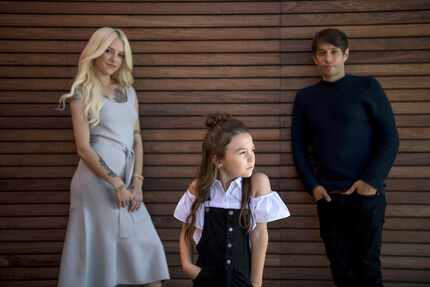Bria Vinaite, left, and Brooklynn Prince, center, who star in "The Florida Project," with...