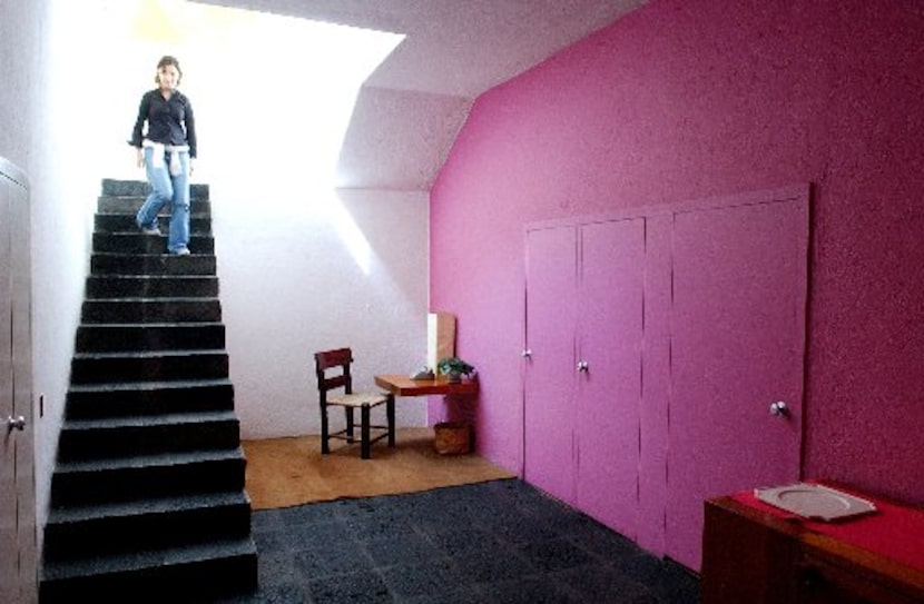 A visitor tours architect Luis Barragan's home, 2004, in Mexico City. More than 10,000...