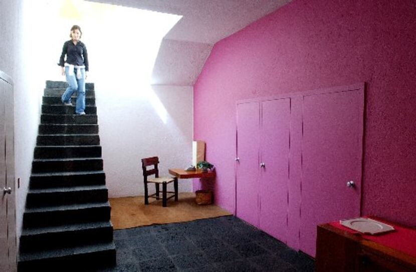 A visitor tours architect Luis Barragan's home, 2004, in Mexico City. More than 10,000...
