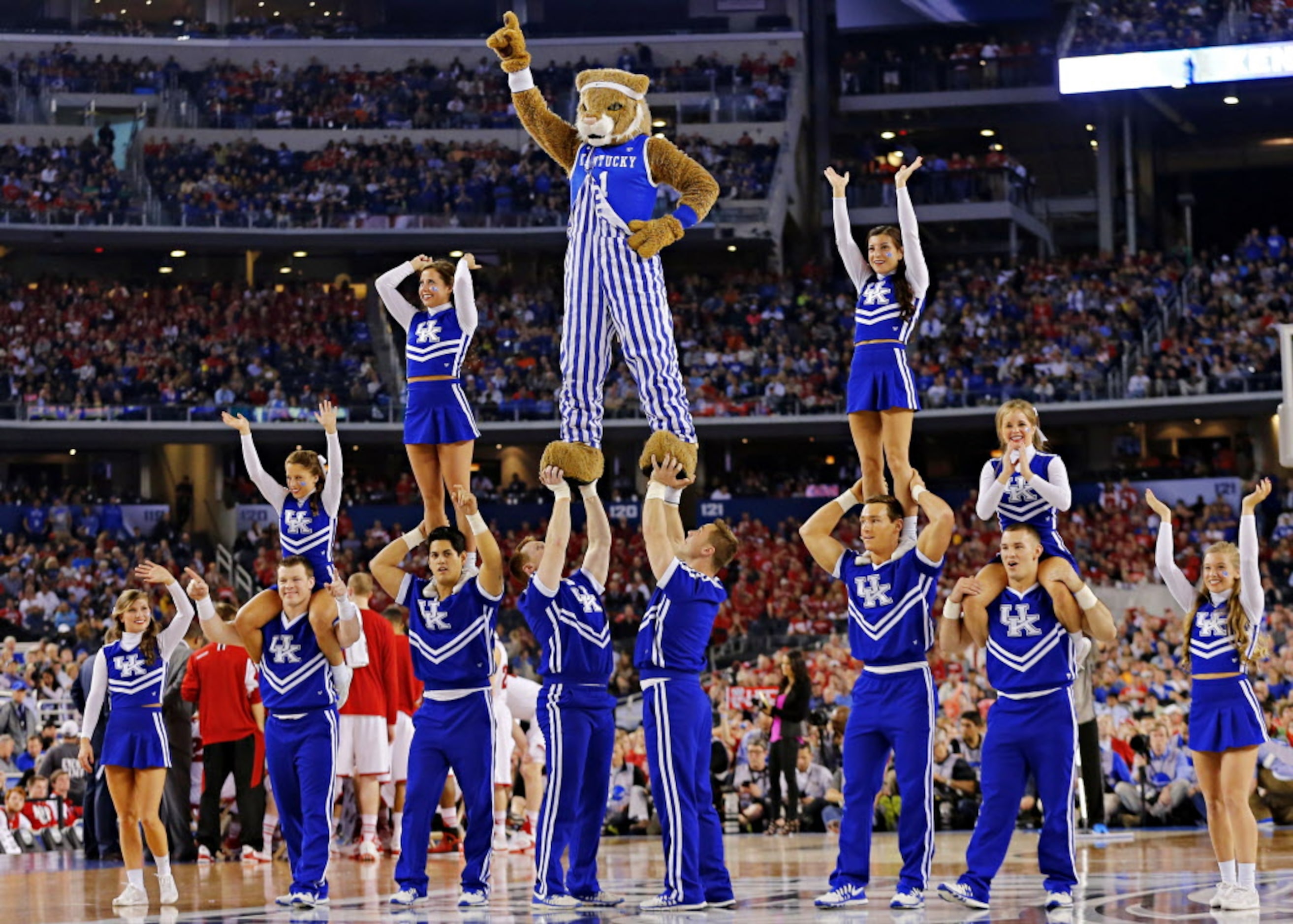 The Kentucky Wildcats cheer squad performs during the second half of their NCAA Final Four...