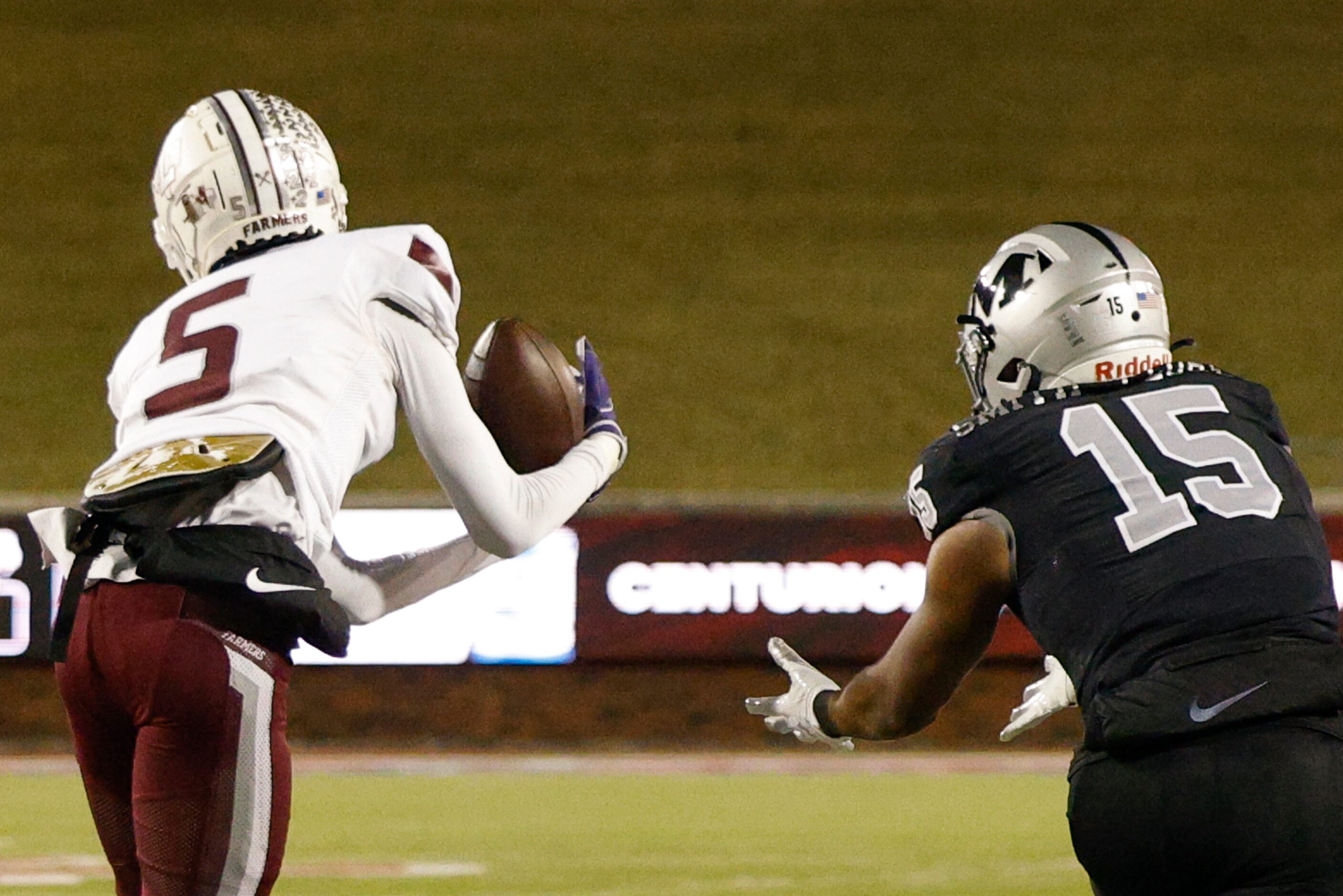 Lewisville defensive back Tony-Louis Nkuba (5) nearly intercepts a pass intended for...