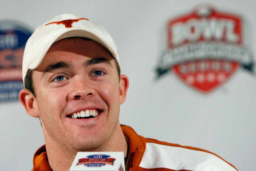 FILE - Texas quarterback Colt McCoy talks to the media during a press conference at the...