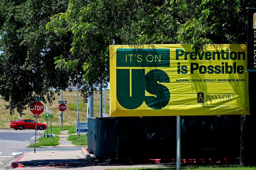 An "It's On Us" campaign sign is placed across Martin Residence Hall on the Baylor...