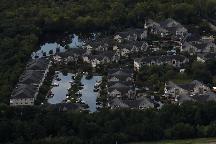 A Houston housing development sits in floodwaters over a week after  Hurricane Harvey hit...