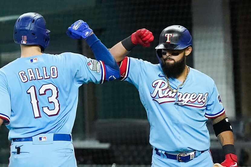Texas Rangers outfielder Joey Gallo celebrates with second baseman Rougned Odor after...
