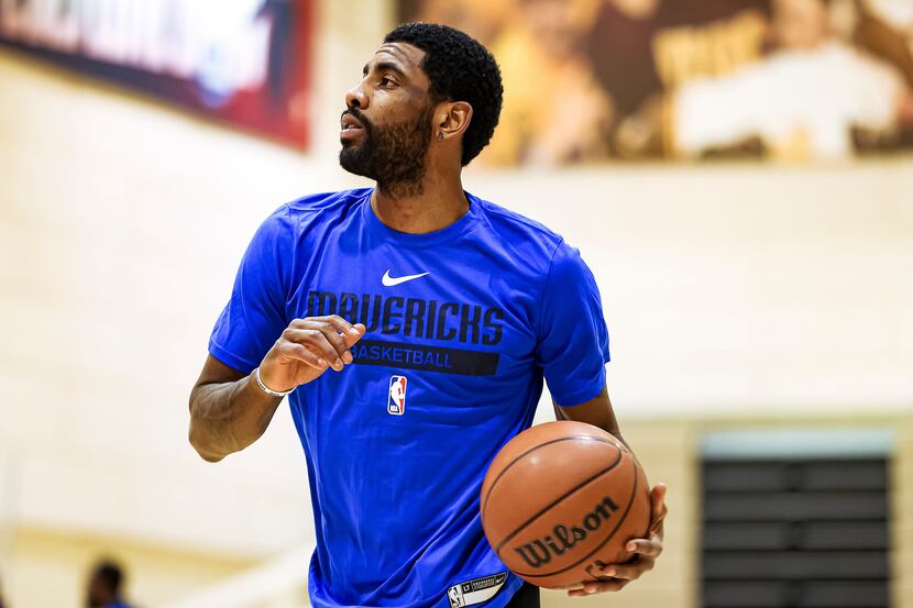 Dallas Mavericks guard Kyrie Irving participates in a team practice on Tuesday, Feb. 7,...