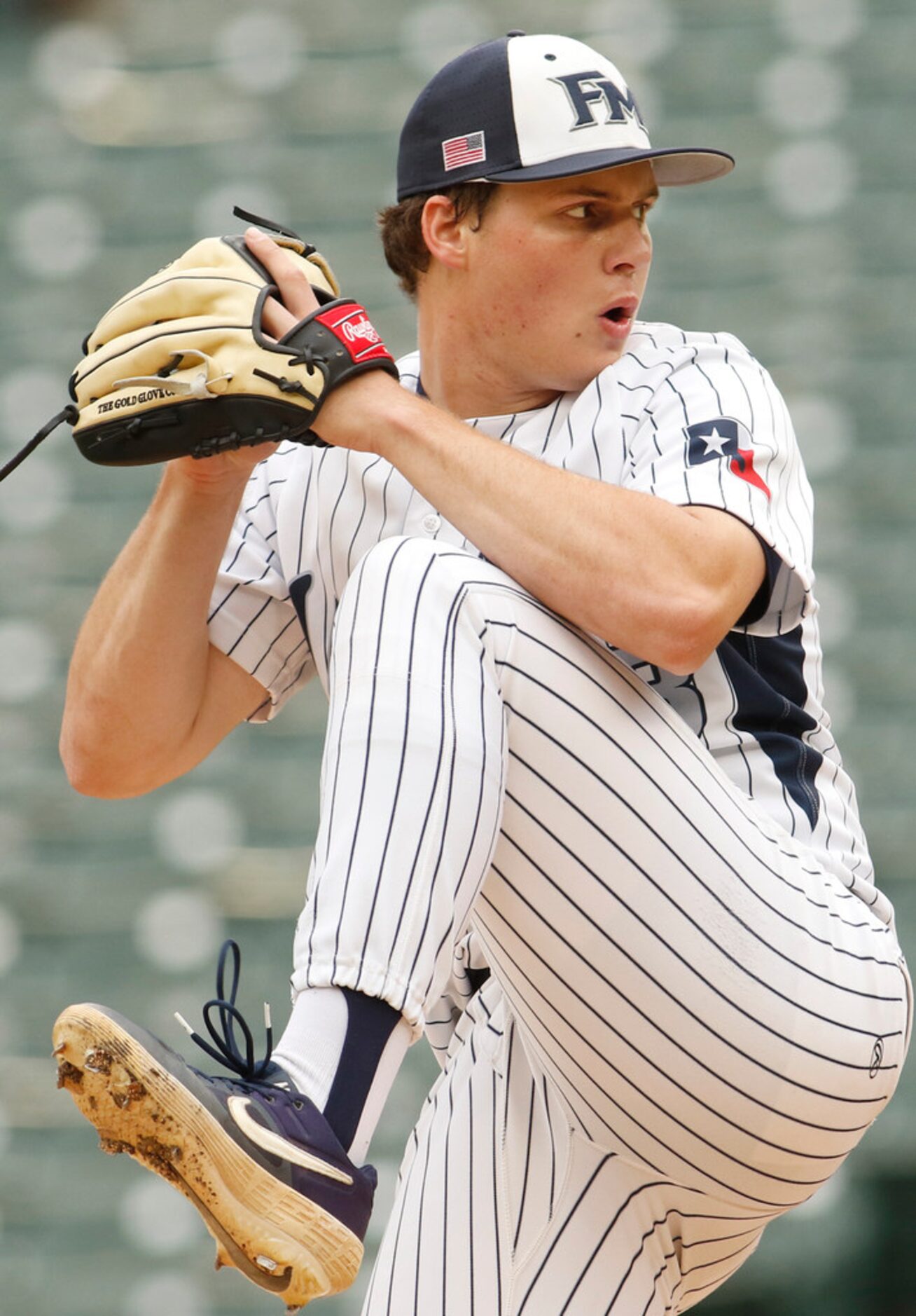 Flower Mound pitcher Cam Brown (18) delivers a pitch to a Mansfield Lake Ridge batter during...