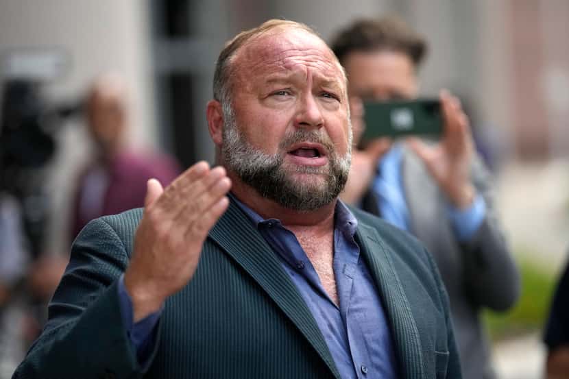 Alex Jones, shown outside the federal courthouse in Houston on June 14, has said he expects...